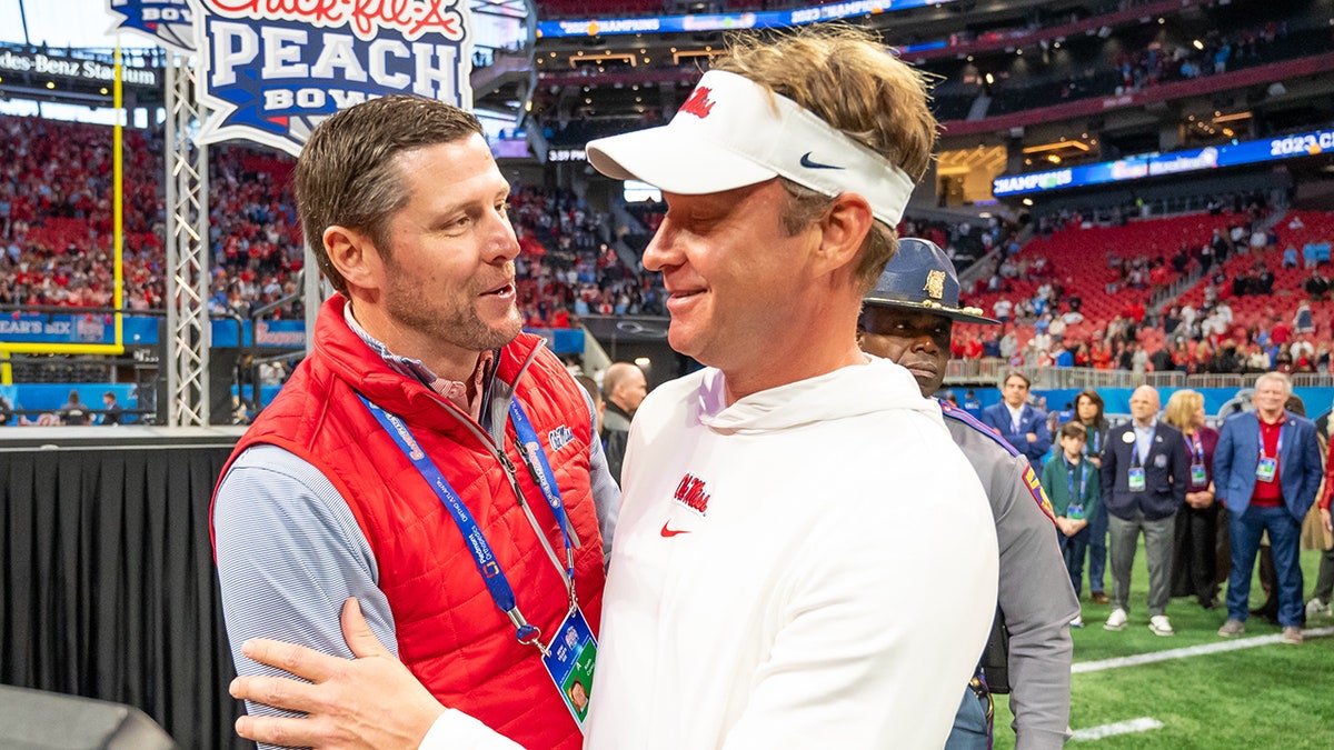 Keith Carter y Lane Kiffin